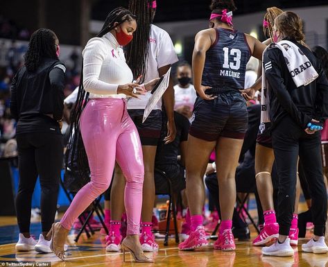 Texas A&M women's basketball assistant coach Sydney Carter, pictured on Sunday, hits back after facing backlash for wearing pink leather pants and stilettos to a game Basketball Coach Outfit, Sydney Carter, Basketball Game Outfit Women, All Black Outfits For Women, Basketball Game Outfit, Coach Carter, Coach Outfits, Game Outfit, Texas Women