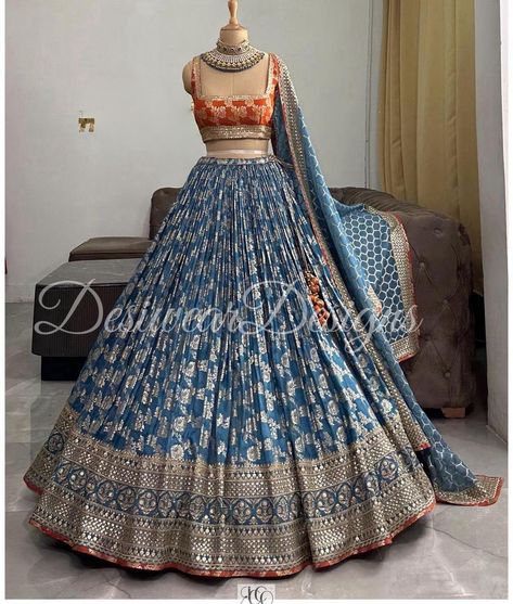 Made to Order/Measurement/Custom Order Lehenga - Color : ice blue - Fabric : Pure Banarasi meenakari Silk - Fully flared paneled lehenga -   Pure Banarasi meenakari Silk -   Attached  Dupatta with Blouse - Drawstring closure with Tassels - - It can be customize in any design or size  PLEASE NOTE: BUYERS ARE RESPONSIBLE FOR ANY CUSTOMS AND IMPORT TAXES THAT MAY APPLY. This is a made to order product. If you opt for 'Made To Measurement Option', we will provide a measurement template and you can share the measurements likewise. If you want to opt for 'Standard Size', Please refer to the size chart provided in the listing. Shipping: Standard Shipping is done by DHL ecommerce and it mostly takes 2 to 3 weeks to deliver after dispatch. Express Shipping is done by DHL express and it mostly deliv Mehndi Color Lehenga, Orange And Blue Lehenga, Orange Banarasi Lehenga, Banarasi Lehenga Blouse Design, Blue Banarasi Lehenga, Silk Lehenga Banarasi, Royal Blue Lehenga, Sangeet Lehenga, Bridesmaid Lehenga