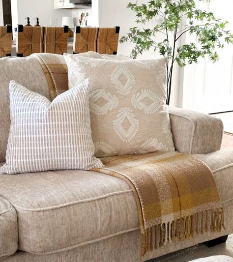 9 Cozy & Cuddly Ways to Style a Throw Blanket on a Couch - Home By Alley Couch Throw Blanket Styling, How To Style Throw Blanket On Sofa, How To Place A Throw Blanket On Couch, How To Drape A Throw Blanket On Couch, Throw Blankets On Couch, Blanket On Ottoman, Throw Blanket On Couch, Tan Throw Blanket, Daybed In Living Room