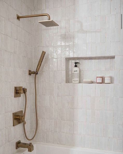 Gold Globe Bathroom Light, Modern Organic Shower Design, Riad Shower Tile, Bathroom Floor To Shower Tile, Tub With Tiled Walls, Alcove Tub With Window, Garden Tub Shower Combo Tile, Signature Hardware Hibiscus Tub, Angled Wall Bathroom Layout