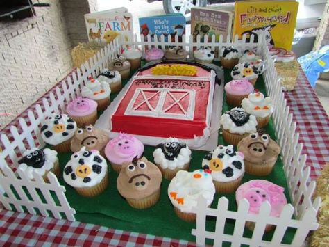 This was the birthday cake for my two year olds farm animal theme party. The base my husband made by covering plywood with felt and adding white fencing from Hobby Lobby.  We added a protective layer of felt that we removed after the cake and it now serves as a "pasture" for her to play with her farm animal toys. Old Macdonald Birthday Cake, Barnyard Birthday Cake, Farmyard Birthday Party, Farm Animal Birthday Cake, Old Macdonald Birthday, Farm Birthday Cake, Barnyard Cake, Barn Cake, Barnyard Birthday Party