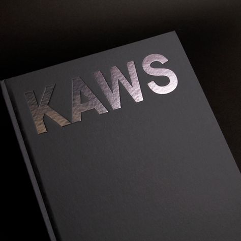 KAWS: Blackout exhibition catalogue - Fonts In Use Forest People, Personal Calendar, Girl Posters, Catalog Design, Typographic Design, Exhibition Poster, Foil Print, Creative Agency, New Work