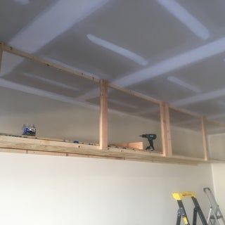 Wasted Space: High Garage Storage Shelves : 8 Steps (with Pictures) - Instructables Diy Overhead Garage Storage, Hanging Garage Shelves, Garage Storage Plans, Easy Garage Storage, Garage Ceiling Storage, Garage Storage Inspiration, Diy Storage Shelves, Overhead Garage Storage, Garage Storage Shelves