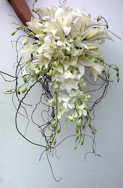 Love this white wedding bouquet with vine, lilies, and dendrobium orchids. Trumpet Lily, Bouquet Images, Unique Bouquet, Dendrobium Orchids, Boda Mexicana, Cascade Bouquet, Dearly Beloved, White Wedding Bouquets, White Wedding Flowers