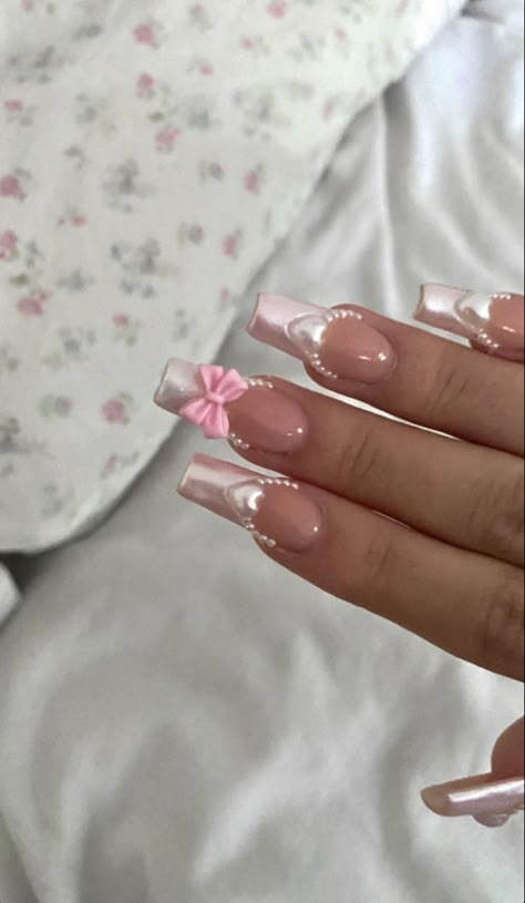 these are soft pink acrylic french nails, perfect for your aesthetic Nails With Bows Rhinestones, Pink Bow Valentines Nails, Pink Nails Ideas Coquette, Acrylic Nails Bow Charm, Pink Nails Princess, Christmas Bow Nails Acrylic, Nail Inspo Coffin Charms, Light Pink Nails Y2k, Girly French Nails