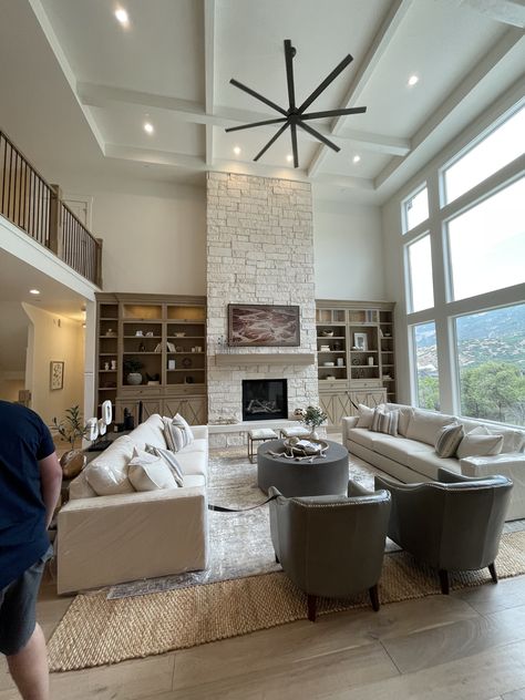 Two Story Living Room Ceiling Fan, Fireplace Living Room High Ceiling, Two Story Open Living Room, 2 Storey Living Room, 2 Story Great Room Ceiling Beams, Big Living Rooms Mansions, Living Room Designs With Tall Ceilings, Farmhouse Living Room Tall Ceilings, Two Story Living Room Ceiling