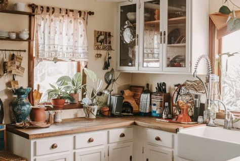 12 Earthy Kitchens with White Cabinets to Transform Your Home’s Heart Kitchen Ideas With White Cabinets, Earthy Kitchens, Earthy Kitchen Ideas, Painted Brick Backsplash, Kitchens With White Cabinets, Decorative Clay Pots, Farmhouse Kitchen Designs, Kitchen With White Cabinets, Earthy Kitchen