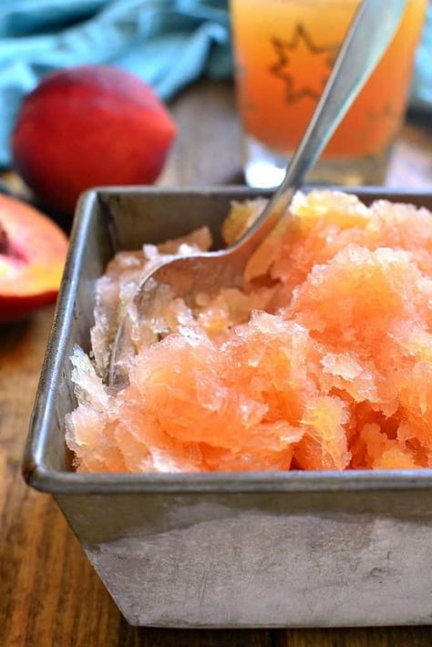 This Frozen Peach Slush is a delicious blend of citrus, peach tea, peach schnapps, and brandy...topped off with your favorite sparkling soda! Perfect for parties, special occasions, or lazy summer days. The perfect drink for summer! Peach Slush, Alcoholic Slush Recipes, Alcoholic Slush, Brandy Slush, Lemon Tree Dwelling, Drink For Summer, Peach Whiskey, Slush Recipes, Cocktail Gin