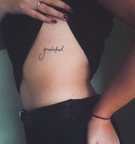 Below Bra Line Tattoo, Grateful Tattoo Fonts, Tattoo Under Bra Line, Grateful Tattoos For Women, Gratitude Tattoo For Women, Tattoos Women Quotes, Under Bra Tattoo, Bra Line Tattoo, Side Tattoos Women Quotes