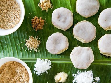 Coconut and Brown Sugar Rice Cakes (Yi Bua) Recipe | SAVEUR Pork And Chive Dumplings, Pork Riblets, Asian Dessert Recipes, Sugar Rice, Rice Desserts, Asian Dessert, Coconut Ginger, Steamed Cake, Ginger Nut