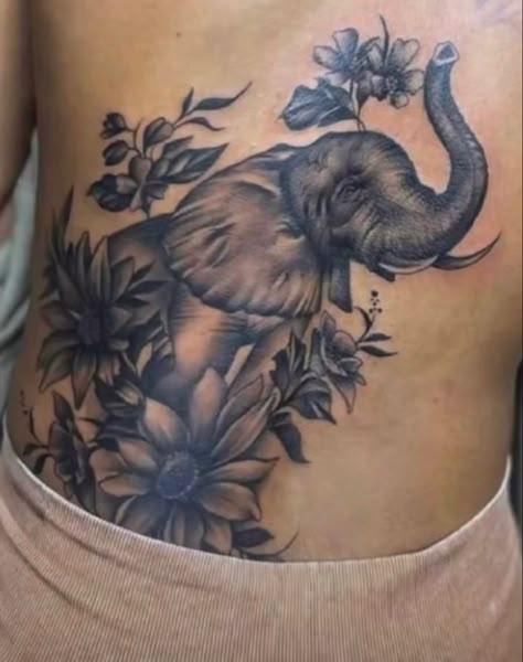 Elephant Blowing Flowers Tattoo, Elephant Thigh Tattoo Black Women, Elephant Thigh Tattoo, Women Half Sleeve, Hand Tattoos For Girls, Highschool Outfits, Nice Tattoos, Flower Tattoo Back, Tattoos For Women Half Sleeve