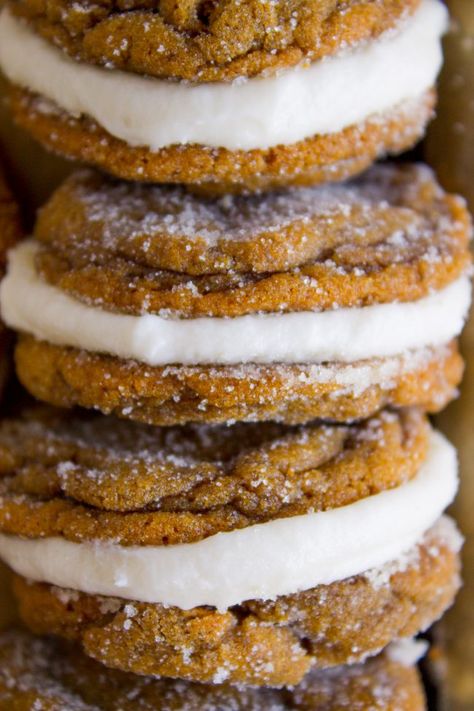 Ginger Molasses Sandwich Cookies with Buttercream Frosting from The Food Charlatan. You thought Ginger Molasses Cookies couldn't get any better, but you were wrong. Smash them together with a thick schmear of vanilla buttercream frosting and they turn into Ginger Molasses Sandwich Cookies, my favorite Christmas cookie! They are soft and perfect. #christmas #recipes #filling #buttercream #frosting #vanilla #cookie #molasses #ginger #spiced #Christmascookie #soft #easy #chewy #oldfashioned #best Molasses Sandwich Cookies, Cookies With Buttercream Frosting, Christmas Dinner Recipes, Holiday Dinner Recipes, Ginger Molasses, The Food Charlatan, Ginger Molasses Cookies, Food Charlatan, Vanilla Buttercream Frosting