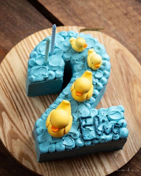 When our little man turned two 🦆 He *really* loves ducks, so there were no tough decisions to be made about how to decorate this 😆 It was j… | Instagram Duck Cake 2nd Birthday, Duck Duck Goose Party, Duck Duck Two Birthday, Bluey Duck Cake Tutorial, Duck Theme 2nd Birthday Party Girl, Duck Party Ideas, Bluey Duck Cake, Duck Cake Ideas, Vanilla Blueberry Cake