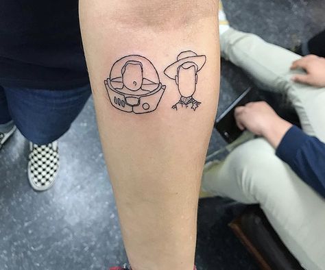 Simple Toy Story Tattoo, Woody And Buzz Tattoo Best Friends, Buzz And Woody Tattoo, Zootopia Tattoo, Lego Tattoo, Toy Story Tattoo, Deer Skull Tattoos, Story Tattoo, Tiny Wrist Tattoos