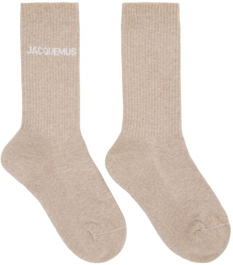 Calf-high stretch cotton-blend jersey socks in beige. Jacquard logo in white at rib knit cuffs. Part of the Le Raphia collection. Supplier color: Light beige Beige Socks, Luxury Socks, Knit Cuff, Light Beige, Luxury Streetwear, Color Light, Stretch Cotton, Rib Knit, Winter Fashion