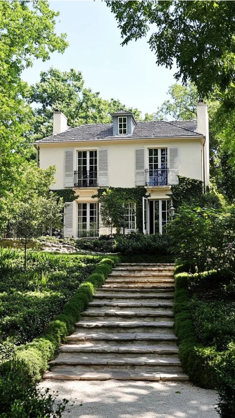 A charming ivy-covered house with grey shutters and a slate roof, surrounded by lush greenery and a stone staircase leading up to the entrance. Modern French House Exterior, Modern French House Design, Modern French Architecture, French House Exterior, French Architecture Homes, Modern French House, French House Design, French Houses, Architecture Homes