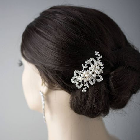 Spruce up your bridal ensemble with our petite clip. This stylish hair ornament showcases dainty ivory freshwater cultured pearl blooms, adding a hint of organic charm to your big day. The clip is about 2.75 inches long and 2 inches high on an alligator style pinch clip. . #bridal #bridalhair #bridalshower #bridaljewellery #hairaccessories #hairaccessoriesonline #hairaccessoriesforsale #hairaccessorieshandmade #hairaccessoriesforgirls #hairaccessoriesforwomen #cassandralynnebridal #wedding #... Bridal Clip, Wedding Clip, Bridal Hair Clip, Wedding Hair Clips, Pearl Hair Clip, Hair Ornaments, Stylish Hair, Girls Hair Accessories, Bridal Hair Accessories