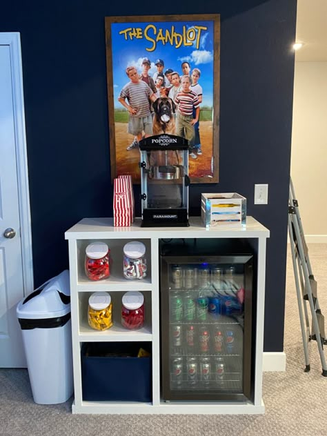 Diy Movie Theater Room Decor, Movie Theatre Loft Ideas, Home Cinema Room Snack Bar, Snack Bar In Game Room, Movie Area In Basement, Gaming Room Snack Bar, Small Bar Fridge, Small Basement Movie Room Ideas, Entertainment Space Ideas