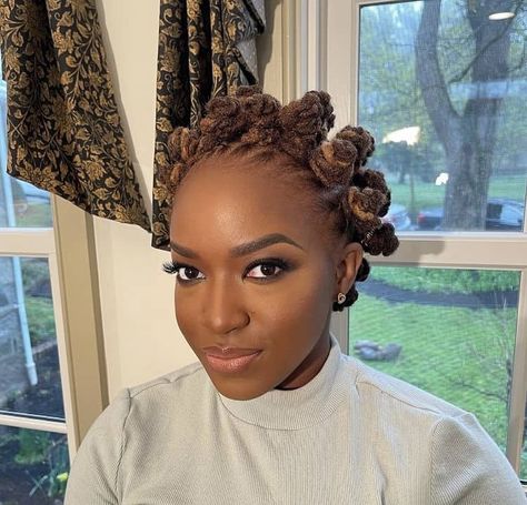 Bantu Knots: How to, Their History & Bantu Knots Hairstyles Locs Bantu Knot Styles, Nubian Knots Styles, Bantu Loc Styles, Dreadlock Updo Hairstyles Black Women, Loc Bantu Knot Styles, Bantu Knots Locs Hairstyles, Bantu Knots With Locs, Bantu Locs, Braided Bantu Knots Hairstyles