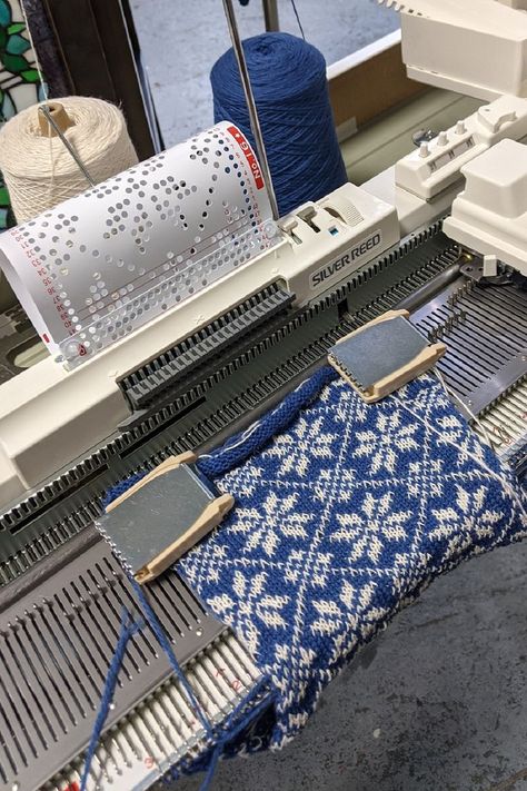 Knitting machine with blue-white snowflake pattern being produced Knitting Machine Inspiration, Machine Knitting Patterns Free, Knitting Machines For Sale, Honeycomb Blanket, Gauge Knitting, Knitting Machine Tutorial, Standard Gauge, Knitting Machines, Knitting Machine Patterns