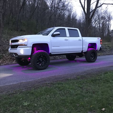 2016 Chevy Silverado 1500 pink rock lights Truck Chevy Silverado, Jacked Up Chevy Silverado, Lifted Chevy Trucks 1500, Trucks With Led Lights, Chevy Trucks Lifted, Pink Chevy Trucks, 2016 Chevy Silverado 1500, 2016 Silverado 1500, 2016 Chevy Silverado