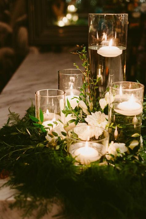 White and green wreath with floating candle centerpiece | Image by Amber Gress Bohemian Wedding Centerpieces, Barbecue Wedding, Gold Wedding Centerpieces, Gold Table Numbers Wedding, Floating Candle Centerpieces, Candle Wedding Centerpieces, Boho Wedding Decorations, Wedding Table Decorations, Candle Centerpieces