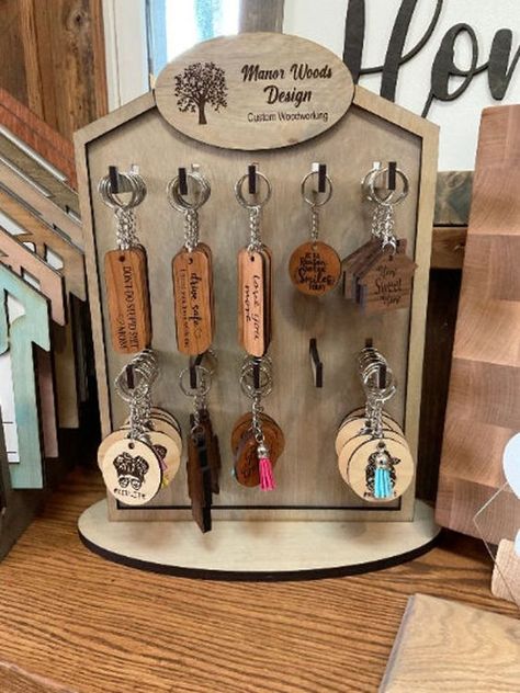 Laser cut files templates Laser Printer Ideas, Key Ring Display, Laser Printer Projects, Keychain Display Ideas, Glowforge Projects Ideas, Acrylic Laser Projects, Glowforge Projects To Sell, Keychain Stand, Laser Cut Wood Jewelry