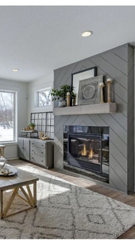 Chevron shiplap fireplace in soft gray  with rustic mantel is the showstopper in this farmhouse living room Farmhouse Fireplace Ideas, Modern Farmhouse Fireplace, Design Camino, Shiplap Fireplace, Farmhouse Fireplace, Fireplace Remodel, Fireplace Ideas, Diy Fireplace, Home Fireplace