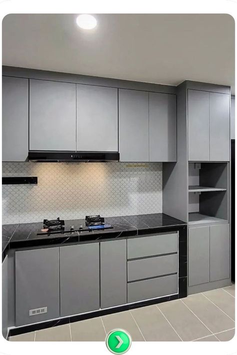 Minimalist gray kitchen cabinets with a matte finish offer ample storage, creating a clean and organized kitchen. Neutral tones allow for versatile decor options. Kitchen Unit Designs, Kitchen Neutral, Cabinet Trends, Gray Kitchen Cabinets, Kitchen Cabinet Trends, Kitchen Unit, Organized Kitchen, Gray Kitchen, New Kitchen Cabinets