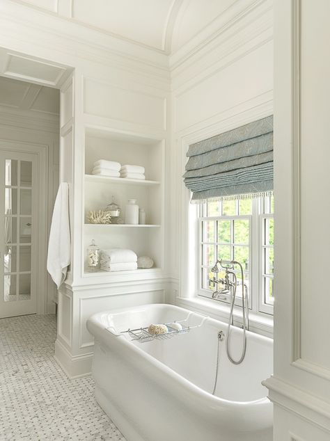 A bathroom with paneling is pretty high up on my “swoon-worthy” list. However, this bathroom surpasses that mark by integrating some cool shelving into the paneling around the tub, creating a truly bespoke and luxurious feeling. See other Master Bathtub Ideas. #luxurybathrooms, #traditionalbathroom, #whitebathrooms Master Bathtub Ideas, Bathroom Freestanding, Bad Inspiration, Bad Design, Bath Tub, Bathroom Remodel Master, Traditional Bathroom, Free Standing Bath Tub, Beautiful Bathrooms