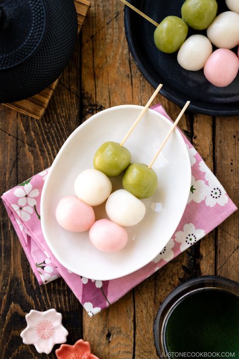 Made with sweetened rice balls on a skewer, Hanami Dango is a popular sweet enjoyed during the cherry blossom viewing in Japan. The dumplings come in three striking colors of pink, white, and green. A sweet start to the arrival of spring! #hanamidango #sanshokudango #dango | Easy Japanese Recipes at JustOneCookbook.com Melon Pan Recipe, Jiggly Japanese Cheesecake, Dango Recipe, Hanami Dango, Paleo Healthy Recipes, Pickled Cherries, Japanese Home Cooking, Freezing Vegetables, Powdered Food Coloring