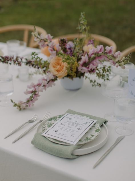 Green Purple Table Setting, Sage Green And Colorful Wedding, Floral Plates Wedding, Purple Peach Sage Wedding, Sage Green And Purple Table Setting, Sage Place Setting, Green Table Scape Wedding, Sage Green Table Setting Wedding Ideas, Green Plates Wedding