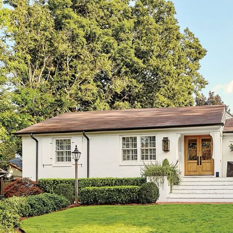 A Dramatic Ranch House Renovation White Exterior Paint Colors Ranch House, 1990 Ranch House Remodel, Ranch House Update Exterior, 1940s Ranch House Exterior, Ranch House Landscaping Ideas, Boring Ranch Exterior Makeover, Ranch House Entryway Exterior, Small Ranch Renovation, Faux Dormers On Ranch House