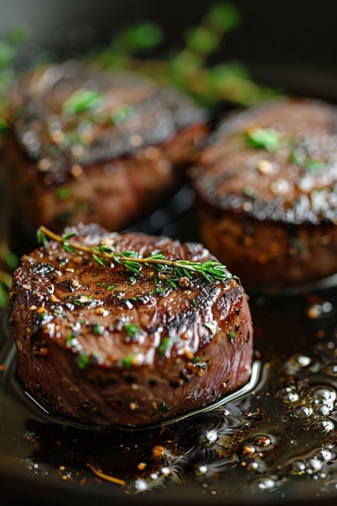 Grilled steak medallions garnished with fresh herbs. How To Cook The Perfect Filet Mignon, Seared Filet Mignon Cast Iron Skillet, How To Cook A Filet Mignon Stove, Stovetop Filet Mignon, Filet Mignon Recipes Iron Skillet, Filet Mignonette In Cast Iron, Cook Filet Mignon In Cast Iron, Filet Cast Iron Skillet, Filet Mignon Seasoning