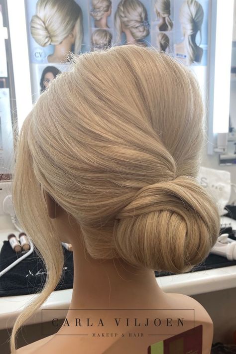 A smooth low bridal bun with height at the crown Hair Updos Blonde, Smooth Wedding Hair, Effortless Low Bun Wedding, Neat Bun Wedding Hair, Blonde Low Bun Wedding Hair, Smooth Low Bun Wedding, Smooth Low Bun, Elegant Bridal Bun, Low Clean Bun