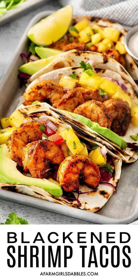 This easy Blackened Shrimp Tacos recipe features charred tortillas stuffed with flavorful blackened shrimp and sweet pineapple salsa. Served with a simple lime crema, these seafood tacos are a favorite around here! Blackened Shrimp Taco, Sweet Chili Shrimp Tacos, Shrimp Tacos Mango Salsa, Shrimp Tacos With Black Beans And Corn, Blackened Shrimp Tacos With Mango Salsa, Blackened Shrimp Tacos, Shrimp Tacos With Mango Salsa, Shrimp Burrito, Seafood Tacos