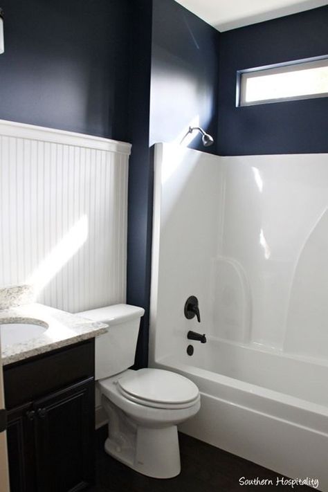 Navy Bathroom Decorating Ideas - Dark walls and white beadboard accent feature wall Royal Blue Bathrooms, Navy Blue Bathroom Decor, Studio Mcgee Bathroom, Mcgee Bathroom, Navy Bathroom Decor, Dark Blue Bathrooms, Navy Blue Bathrooms, Beadboard Bathroom, Navy Bathroom