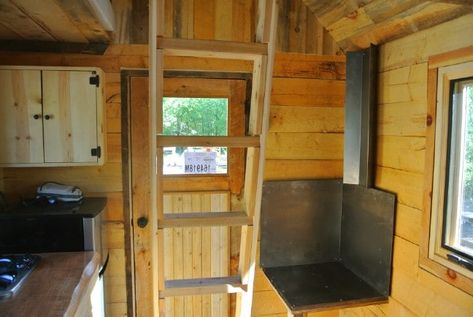 This Rustic Tiny Dream Cabin Fits on a 8x12 Single Axle Trailer - If you have ever dreamed of having your own tiny rustic cabin that you can take with you wherever you go, then you'll fall in love with “The Stanley,” an amazing rustic tiny house designed by Rocky Mountain Tiny Houses. 8x12 Tiny House, Log Cabin Tiny House, Cabin Fits, Tiny Rustic Cabin, Tiny Log Cabins, Tiny Log Cabin, Rustic Tiny House, Tiny House Swoon, Log Cabin Interior