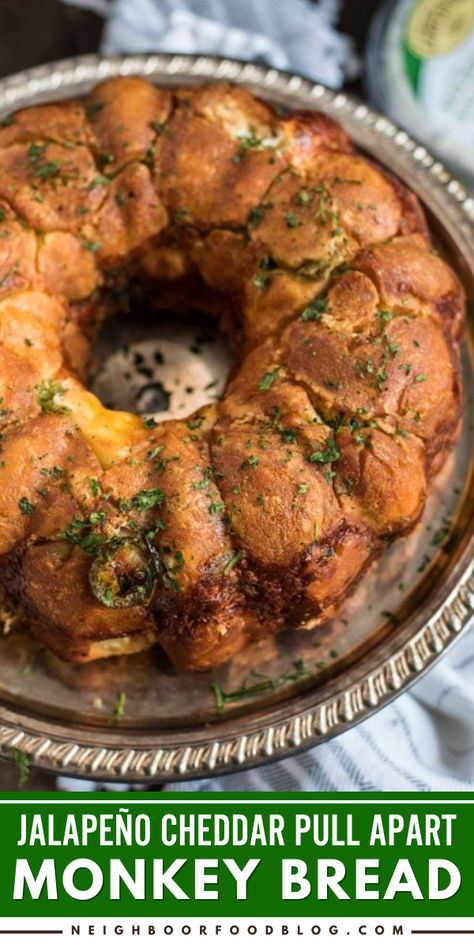 Want more best game day recipes? This Jalapeno Cheddar Pull Apart Monkey Bread recipe features savory monkey bread stuffed with cheddar cheese, garlic, and creamy jalapeno artichoke dip. Prepare this fun party snack, and save it for your easy appetizer recipe for a crowd! Jalapeño Cheese Monkey Bread, Jalapeno Artichoke Dip, Jalapeno Cheddar Bread, Cheddar Bread Recipe, Easy Thanksgiving Recipes Appetizers, Pull Apart Monkey Bread, Savory Monkey Bread, Jalapeno Cheese Bread, Thanksgiving Appetizers Easy