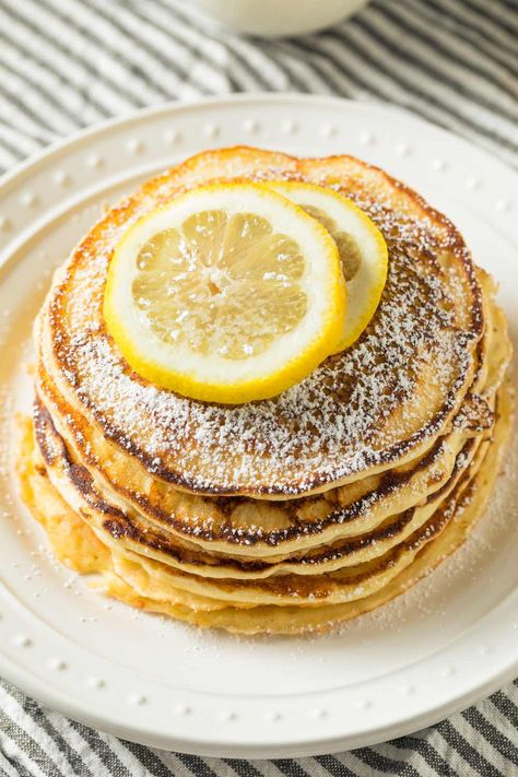 This lemon ricotta pancake recipe by Bobby Flay features common pantry items like all-purpose flour, ricotta cheese, eggs, and fresh lemon. With a prep time Ricotta Pancakes Recipe, Fluffy Lemon Ricotta Pancakes, Lemon Ricotta Pancakes Recipe, Italian Breakfast Recipes, Fluffy Pancake Recipe, Lemon Ricotta Pancakes, Better Breakfast, Baking Measurements, Ricotta Pancakes