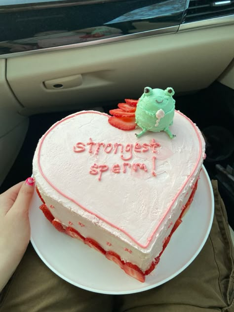 pink heart cake with frog on it and says strongest sperm! Homemade Heart Cake, Cake To Make With Friends, Cake With Quotes, One Year Closer To Being A Mil Cake, Funny Birthday Cake Sayings, Birthday Cake For Women Funny, 18th Birthday Cake Funny, Birthday Cake Funny Quotes, Birthday Cake Ideas Funny