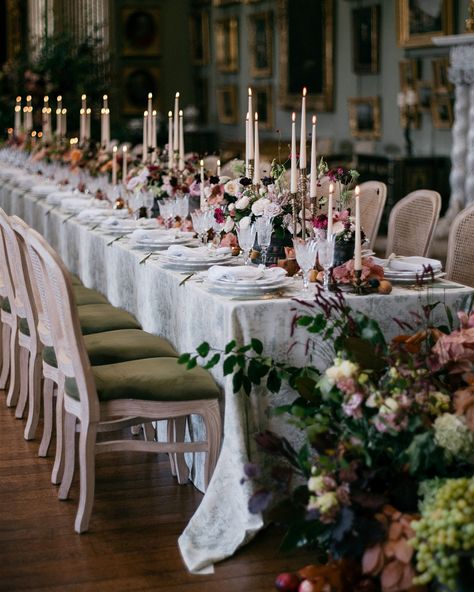 Sultry tones at the iconic Somerley House At the end of summer we visited the beautiful Somerley House in Hampshire to create a trilogy of immersive spaces. We filled the Picture Gallery with rich, sumptuous tones and candlelight to create a romantic and sultry wedding breakfast for guests to dine in. The floral installation created the backdrop to our scene and framed the divine portrait at the end of the hall. The installation was filled with fluffy hydrangea, endless roses and sunset co... Late Summer Wedding Colors, Summer Wedding Colors Schemes, Sultry Wedding, Somerley House, Wedding Colors Schemes, August Weddings, Wedding Color Schemes Summer, Late Summer Wedding, Late Summer Weddings