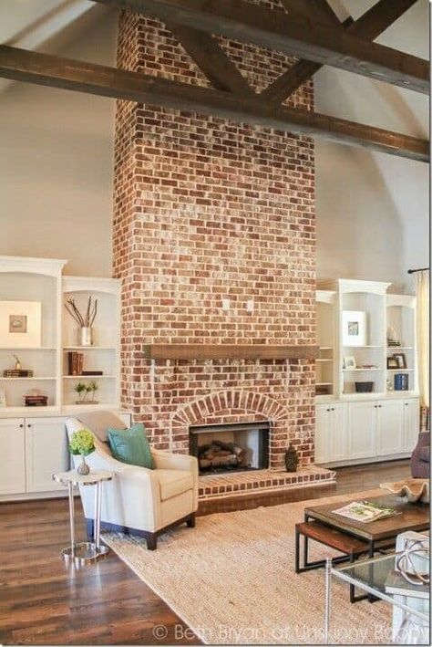 Did you ever think brick fireplaces would become popular again….or that people would actually want to include them in their “must haves” for their new home builds??!! Well, I am here to tell you – yes & well… YES.  They are still going strong my friend.  35 Gorgeous Natural Brick Fireplace Ideas (Part 2) and you won’t want to miss all the good info!! And for those of you have “remove ugly brick fireplace” on your bucket list, there is hope for you too.  You can white-wash it, or thanks to Chip Red Brick Fireplaces, Faux Beams, Farmhouse Fireplace, Ideas Ikea, Trendy Living Rooms, Indoor Fireplace, Home Fireplace, Fireplace Makeover, Brick Fireplace