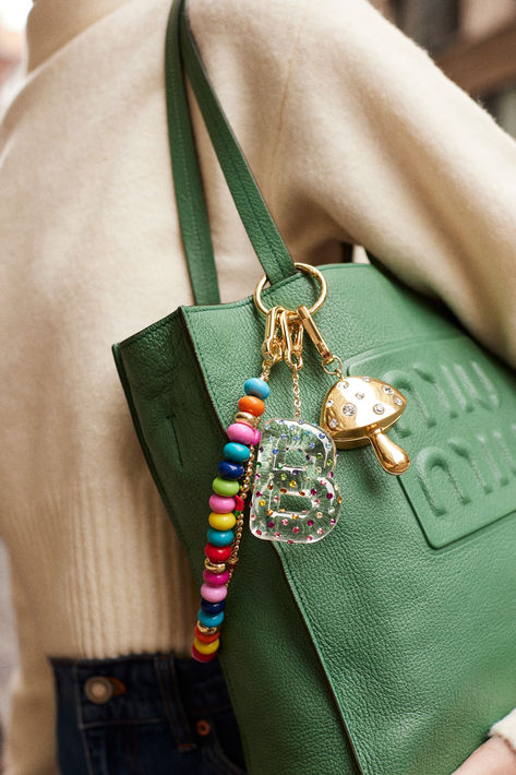 Add some vibrant hues to your purse with the Confetti Initial Bag Charm. Featuring the letter of your choosing in a bold, bubble-letter font, this bold Bag Charm is embellished with dainty multicolored stones for added sparkle. Treat yourself to an bag charm that will bring a pop of color to any bag! Bag Charm Ideas, Cute Bag Charms, Diy Bag Charm, Purse Charms Diy, Purse Decorations, Charm Ideas, Shop Bag, Totes Bag, Ups Shipping