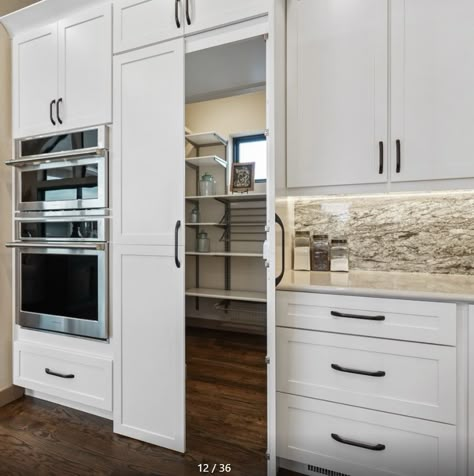 Kitchen Cabinet Walk In Pantry, Pantry Between Kitchen And Garage, Fake Cabinet Pantry Door, Fake Pantry Door, Faux Cabinet Pantry Door, Pantry Hidden In Cabinets, Kitchen Design Medium Size, Kitchner Ideas, Kitchen With Door In Middle