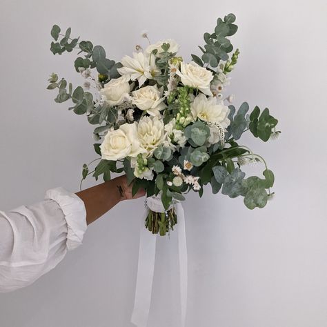 White and Green bridal bouquet made with dahlias, roses and gum White And Green Bridal Bouquet, Native Bouquet, Green Bridal Bouquet, Gum Leaves, Dahlia Bouquet, Eucalyptus Bouquet, Green Bouquet, Rose Wedding Bouquet, Wedding Leaves