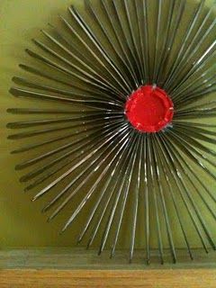 How to make a recycled plastic knife starburst wreath · Recycled Crafts | CraftGossip.com Plastic Spoon Crafts, Plastic Knife, Craft Christmas Gifts, Creative Wreaths, Spoon Crafts, Plastic Silverware, Plastic Utensils, Nail Polish Storage, Nail Polish Organizer