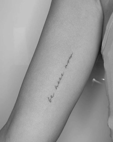 be here now Minimalist Script Tattoo, Text Tattoo Arm, Tattoo Word Fonts, Script Tattoos, Wörter Tattoos, Tattoo Fonts Cursive, Script Tattoo, Cursive Tattoos, Writing Tattoos