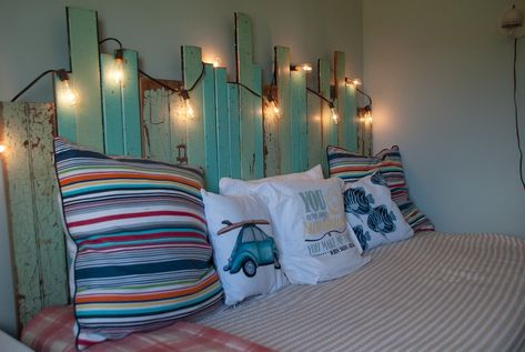 Picket fence headboard and beautiful fun pillows Fence Post Headboard, Fence Headboard With Lights, Seashell Headboard Diy, Picket Fence Headboard, Pallet Board Headboard With Lights, Fence Headboard, Barnwood Headboard With Lights, Small Water Fountain, Unique Headboards