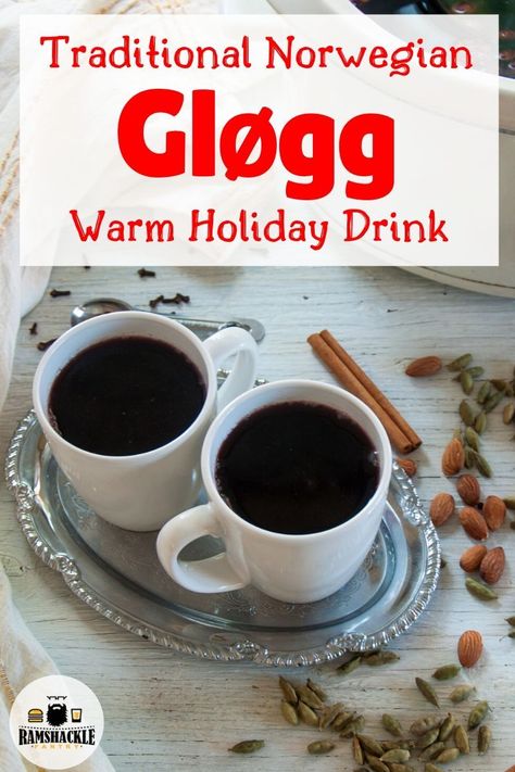 This is an easy traditional Norwegian Glogg Recipe. It is an amped-up crockpot mulled wine recipe meant to appease the Scandinavian in you. Whether for a party or for your holiday dinner, this recipe will warm your soul and connect you to a Scandinavian heritage. #glogg #mulledwine #norway #swedish #norwegian #holidaydrink Norwegian Drinks Recipes, Glogg Recipe Norwegian, Norwegian Christmas Dinner, Norwegian Christmas Recipes, Glogg Recipe Swedish, Norwegian Christmas Traditions, Scandinavian Drinks, Norwegian Food Recipes, Norwegian Christmas Food